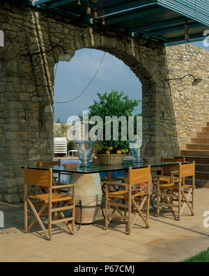 View of an elegant seating arrangement by a pool Stock Photo