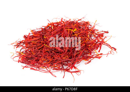 A lot of saffron isolated on white background. Stock Photo