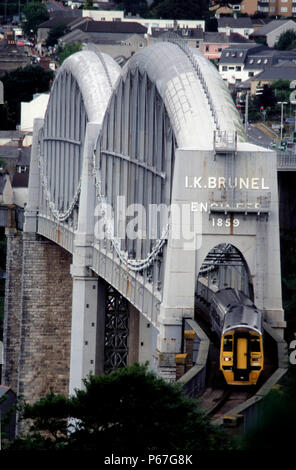 I K Brunel's Royal Albert Bridge which spans the river Tamar at Saltash and forms the border between Devon and Cornwall with a Wessex Trains service h