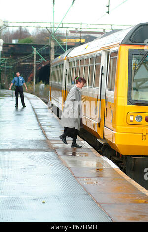 The Merseyrail services operating out of Liverpool Lime St extend beyond the Mersey area including this Liverpool-Manchester Victoria working seen pic Stock Photo