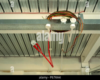 Electrical wires hanging out, office space in shell condition Stock Photo