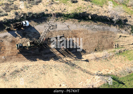 Aerial view of oil drilling rigs in the hills of Los Angeles, California, USA Stock Photo