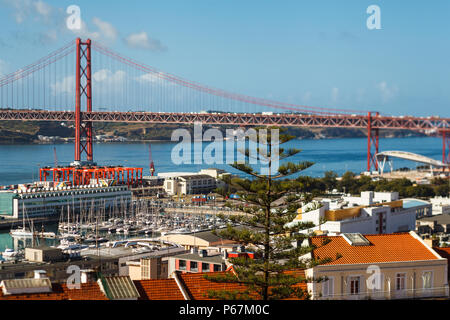 25 th April Bridge connecting Lisbon to municipality of Almada, Tejo river Stock Photo