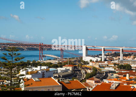25 th April Bridge connecting Lisbon to municipality of Almada, Tejo river Stock Photo