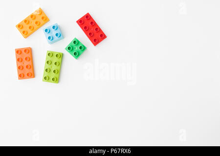 toy bricks of assorted colors on white background Stock Photo