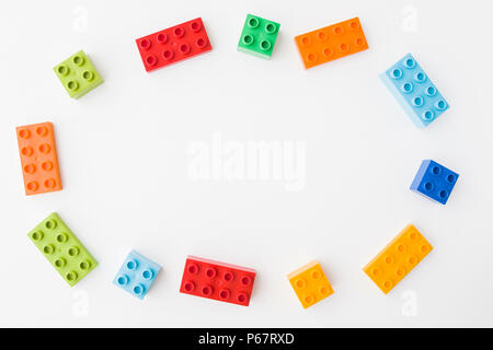 toy bricks of assorted colors on white background Stock Photo