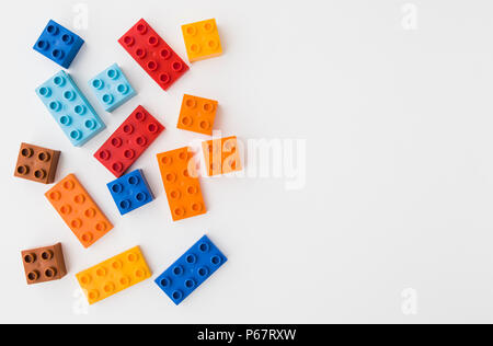 toy bricks of assorted colors on white background Stock Photo