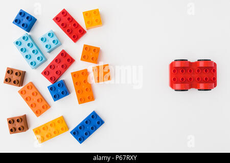 toy bricks of assorted colors on white background Stock Photo