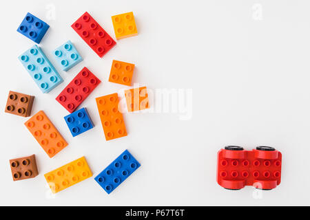 toy bricks of assorted colors on white background Stock Photo