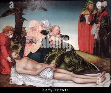 The Lamentation, c 1518 by Lucas Cranach the Elder (1472-1553). This painting depicts the moments after Christ was taken down from the cross.  His elongated body fills the lower half of the picture and his expression has frozen into a tortured unfocused gaze.  St John the Evangelist is shown cradling Christ's head, alongside the virgin Mary and Mary Magdalene.  Joseph of Arimathaea is in the background.  He got permission from the Romans to take down the body of Christ. Stock Photo