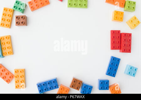toy bricks of assorted colors on white background Stock Photo