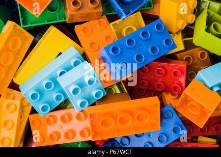 toy bricks of assorted colors on white background Stock Photo