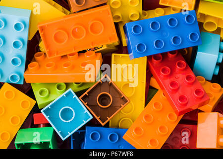 toy bricks of assorted colors on white background Stock Photo
