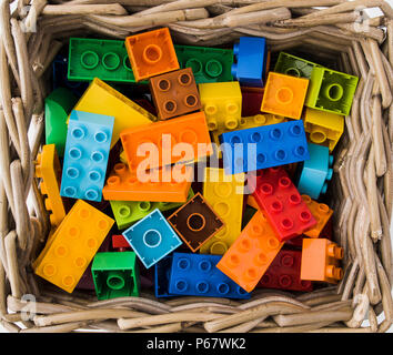 toy bricks of assorted colors on white background Stock Photo