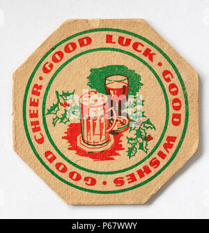 Vintage Pub Beer Mat Advertising Good Luck and Good Wishes Stock Photo