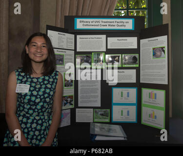 At the 34th Annual Society of Women Engineers Celebration and Awards Banquet on May 22, 2016, in San Diego, junior division science fair winner Ella Lifset displayed her project. SWE honored Alice May Anderson, a pioneer in STEM and one of the first human computers, and recognized scholarship recipients, science fair winners, and organizational leaders from across the community, promoting education, innovation, and inclusion in STEM fields. Stock Photo