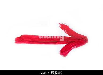 Red hand painted arrow with brush strokes isolated on the white background Stock Photo