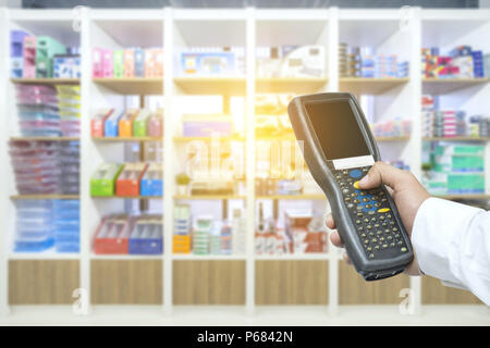 Worker checking and scanning package by tablet handheld in warehouse, Selective focus Stock Photo