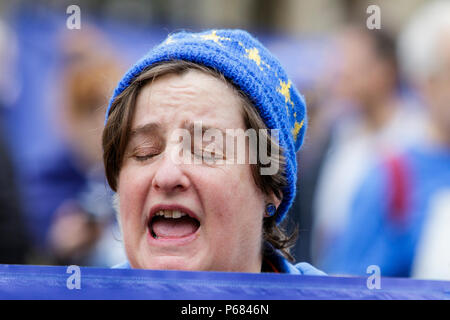 A protester takes part in a rally marking International Women's Day, in ...