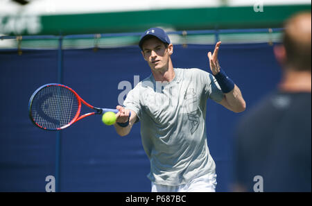 Andy Murray hits the ball in his practice session before he was due to play Stan Wawrinka later in the day during the Nature Valley International tennis tournament at Devonshire Park in Eastbourne East Sussex UK. 25 June 2018 Stock Photo