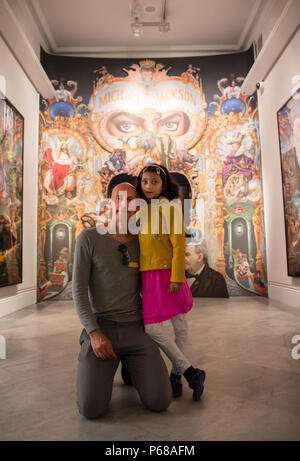 London, UK. 28th June, 2018. Rowan Gillies from Southz Africa and his daughter Tara, 8, at the exhibition 'Michael Jackson: On The Wall' at the National Portrait Gallery. Credit: Tobias Schreiner/dpa/Alamy Live News Stock Photo