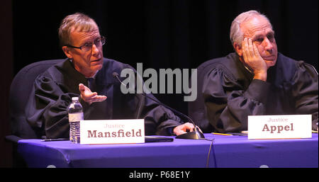 Davenport, Iowa, USA. 12th Oct, 2017. Justice Edward Mansfield of Des Moines (Left) and member of the Iowa Supreme Court asks a question during oral arguments precented by Assistant Attorney General Louis Sloven of Des Moines, Thursday, October 12, 2017, during a special session of the Iowa Supreme Court held in the Performing Arts Center at Davenport Central High School. The case is the State of Iowa v. Carlos Ariel Gomez Garcia. Credit: John Schultz/Quad-City Times/ZUMA Wire/Alamy Live News Stock Photo