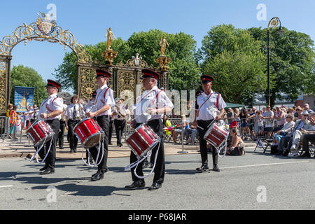 Warrington, UK. 29 June 2018 - The weather was hot and sunny for Warrington Walking Day. This annual religious event begins in front of the Town Hall and leraves through the famous golden gates with the procession following the closed streets and through the town centre Credit: John Hopkins/Alamy Live News Stock Photo