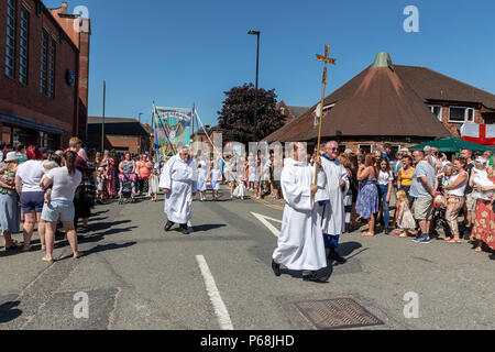 Warrington, UK. 29 June 2018 - The weather was hot and sunny for Warrington Walking Day. This annual religious event begins in front of the Town Hall and leraves through the famous golden gates with the procession following the closed streets and through the town centre Credit: John Hopkins/Alamy Live News Stock Photo