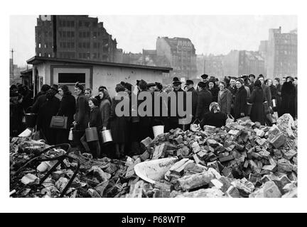 Hungry crowd of people, in the city of Hamburg; Germany March 26, 1946 during the aftermath of World war Two Stock Photo