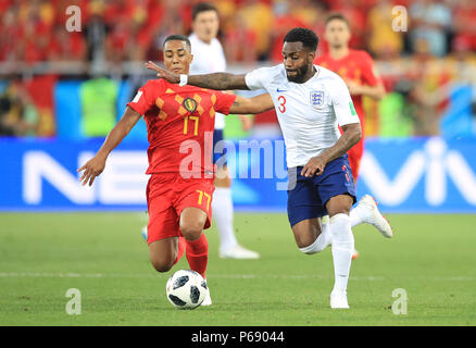 England's Danny Rose (right) and Belgium's Youri Tielemans (left) battle for the ball during the FIFA World Cup Group G match at Kaliningrad Stadium. Stock Photo