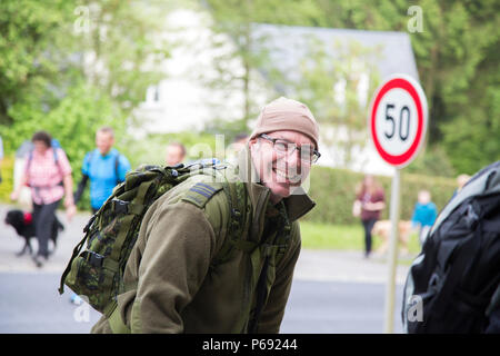 Participants march in the 49th Annual Marche Internationale de Diekirch, Diekirch, Luxembourg, May 21, 2016. This is an annual international marching event hosted by the Luxembourg Army and the city of Diekirch. Civilians and Military participants complete 80 kilometers during a two day period around the vicinity of Diekirch, Luxembourg. (U.S. Army photo by Spc. Tracy McKithern/Released) Stock Photo
