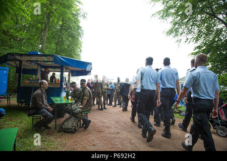 Participants march in the 49th Annual Marche Internationale de Diekirch, Diekirch, Luxembourg, May 21, 2016. This is an annual international marching event hosted by the Luxembourg Army and the city of Diekirch. Civilians and Military participants complete 80 kilometers during a two day period around the vicinity of Diekirch, Luxembourg. (U.S. Army photo by Spc. Tracy McKithern/Released) Stock Photo