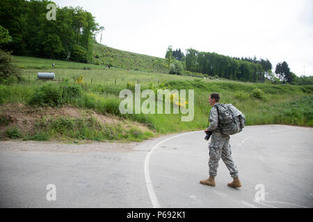 Participants march in the 49th Annual Marche Internationale de Diekirch, Diekirch, Luxembourg, May 21, 2016. This is an annual international marching event hosted by the Luxembourg Army and the city of Diekirch. Civilians and Military participants complete 80 kilometers during a two day period around the vicinity of Diekirch, Luxembourg. (U.S. Army photo by Spc. Tracy McKithern/Released) Stock Photo