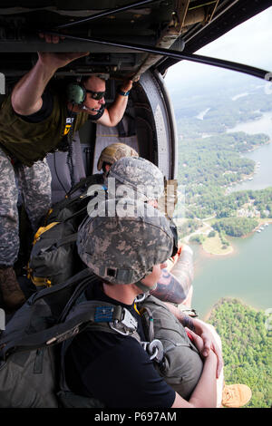 Rangers from the 1st Battalion executed parachute jumps from a UH-60 ...