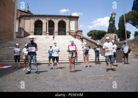 Rome, Italy. 28th June, 2018. Flash mob in Piazza del Campidoglio in Rome organized by the association July 21 to demand the immediate suspension of Piano ROM of the Giunta of Mayor of Rome Virginia Raggi, which is leading to the systematic violation of human rights Credit: Matteo Nardone/Pacific Press/Alamy Live News Stock Photo
