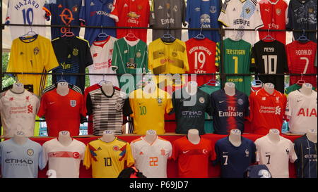 Football strips on sale in a market in Turkey Stock Photo