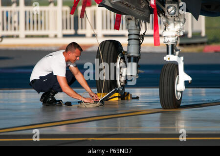 On May 26, 2016, a U.S. Air Force F-35 Lightning II crew chief from the 56th Fighter Wing, Luke Air Force Base, Arizona, performed diagnostic checks on the aircraft using a laptop at the 177th Fighter Wing of the New Jersey Air National Guard. The stop was part of the USAF F-35 Heritage Flight Team’s journey to the Jones Beach Airshow in Wantagh, New York, May 28–29. The aircraft is a single-seat, single-engine stealth multirole fighter with supersonic capability, advanced avionics, and integrated systems designed for operational readiness and mission performance. Stock Photo