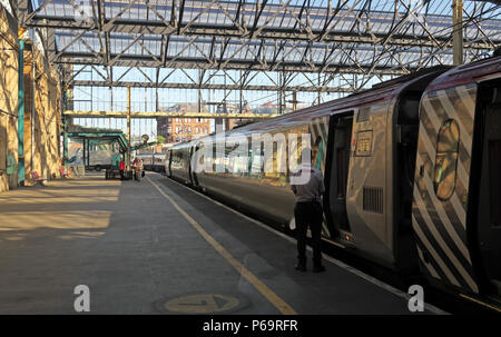 Virgin Voyager  diesel, DMU train, at Carlisle Railway Station, Cumbria, England, UK Stock Photo