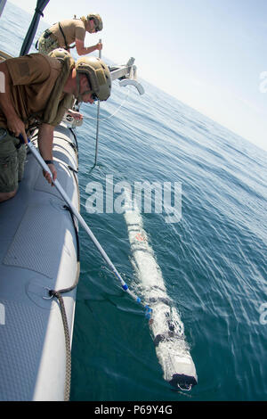 160514-N-SF508-102 PANAMA CITY, Fla. (May 14, 2016) — Engineman 2nd Class Jonathan Lavoie (left) and Aerographer’s Mate 1st Class Christopher Kyall (right), assigned to Mobile Diving and Salvage Unit 2 (MDSU) Unmanned Systems Platoon 204, prepare to deploy a Mark 18 Mod. 2 unmanned underwater vehicle during an Expeditionary Mine Countermeasure (ExMCM) certification exercise at Naval Support Activity Panama City, Fla.(U.S. Navy photo by Mass Communication Specialist 2nd Class Charles Oki/Released) Stock Photo