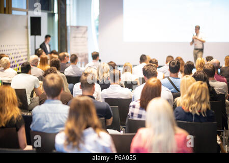 Business speaker giving a talk at business conference event. Stock Photo