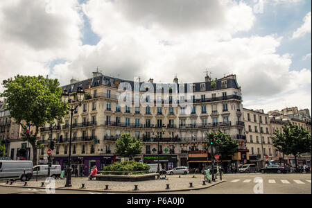 Haussmann-style apartment buildings at a street corner in Paris, France. Stock Photo