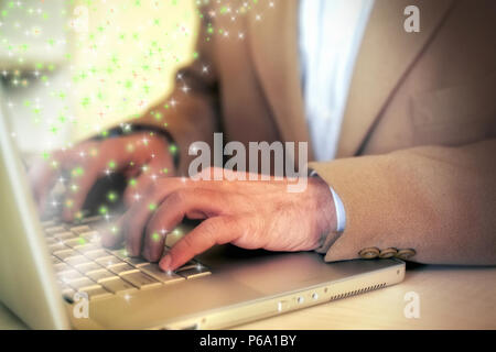 close up shot of businessman fingers typing on a laptop Stock Photo