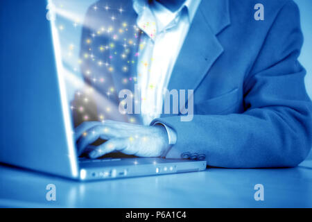 close up shot of businessman fingers typing on a laptop Stock Photo