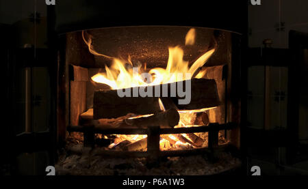 fireplace stove with burning wood in Amsterdam house Stock Photo