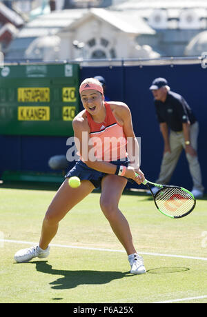 Jelena Ostapenko of Latvia in action against Kaia Kanepi  of Estonia during the Nature Valley International tennis tournament at Devonshire Park in Eastbourne East Sussex UK. 26 June 2018 Stock Photo