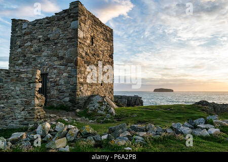 This is Dough Island Castle in Donegal Ireland.  the picture was taken just before the sunset Stock Photo