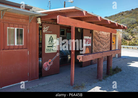 Lookout Roadhouse  on Ortega Hwy displaying the national forest adventure pass for sale  sign. Lake Elsinore California USA Stock Photo