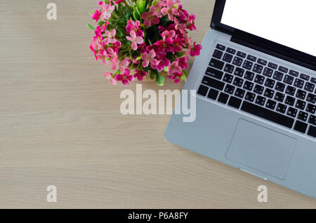 laptop blank screen on wooden table Stock Photo