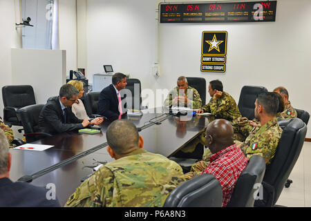At the center Italian Army Colonel Federico Pognant Airassa, Public Information Officer Land forces Operational Command (COMFOTER), speaks during the meeting media strategies in Caserma Ederle, Vicenza, Italy, May 31, 2016 with delegation of the U.S. Army and Italian Army staff. Italian Army visit U.S. Army, in order to enhance to bilateral relations and to expand levels of cooperation and the capacity of the personnel involved in joint operations. (Photo by Visual Information Specialist Paolo Bovo/Released)