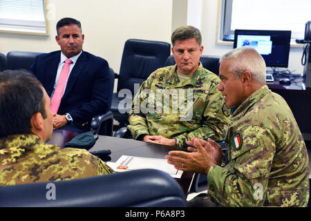 Director Seifert Charles Matthew, Directorate of Plans Training Mobilization and Security “DPTMS” (left), Colonel Steven M. Marks, commander United States Army Garrison Italy (center), Italian Army Colonel Federico Pognant Airassa, Public Information Officer Command of land forces operational “COMFOTER” (right), during the meeting media strategies in Caserma Ederle, Vicenza, Italy, May 31, 2016. Italian Army visit U.S. Army, in order to enhance to bilateral relations and to expand levels of cooperation and the capacity of the personnel involved in joint operations. (Photo by Visual Information